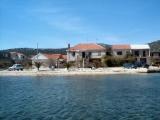 Three Palms Apartments are situated in the center of the bay and Vinisce on the beach literally a dozen...