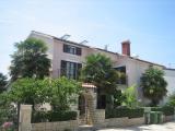 This family house has 3 apartments and it is situated in a calm neighborhood, which has a playground...